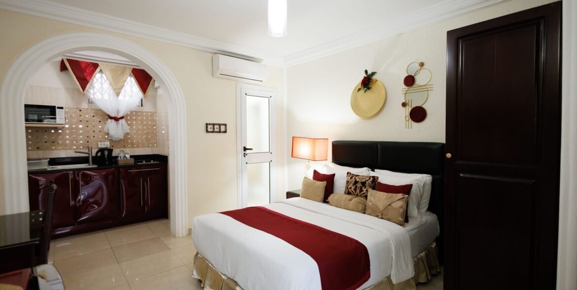 Wide view of the Standard Double Room and kitchenette