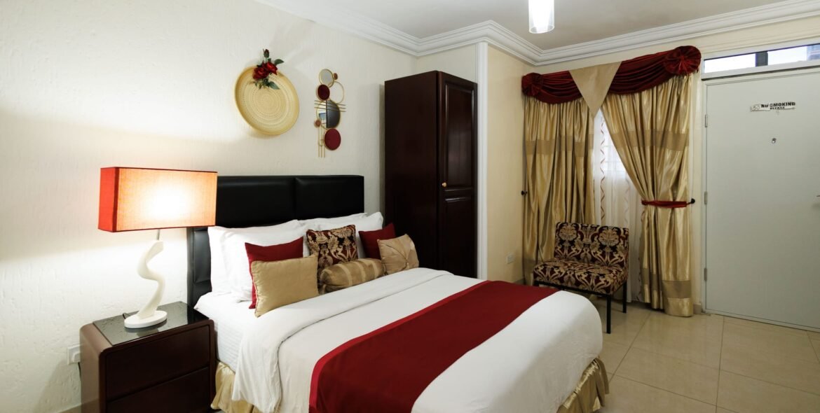Bed and furnishings in the Standard Double Room