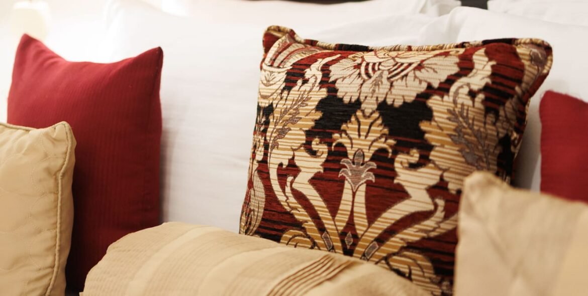 Bed linen and cushions in the Standard Double Room