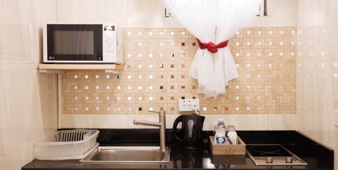 Kitchenette sink and window in the Standard Double Room